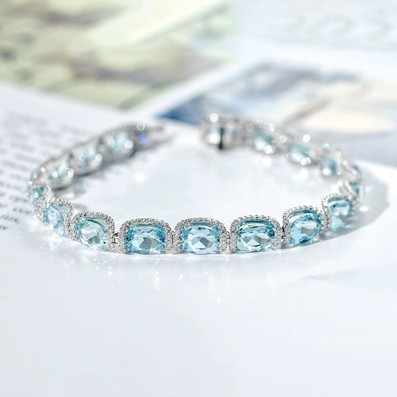 Ocean Blue Elegance 18K White Gold Aquamarine Halo Diamond Bracelet