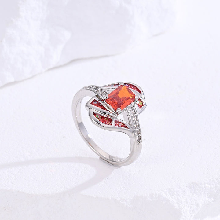 Sterling Silver Princess Cut Red Stone Twisted Ring