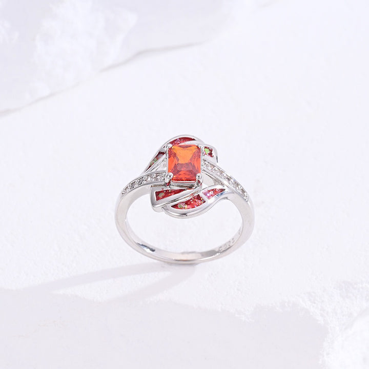Sterling Silver Princess Cut Red Stone Twisted Ring