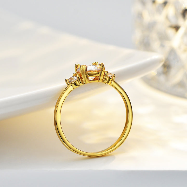 Classic Trilogy Three Stone Round Cut Ring