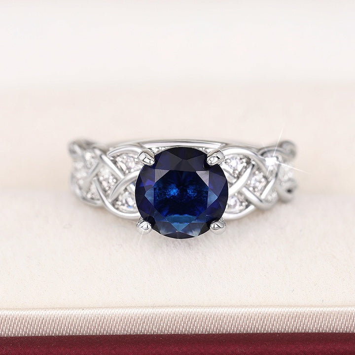 Celtic Promise S925 Sterling Silver Intertwined Blue Gemstone Ring