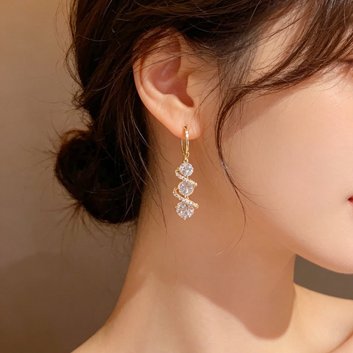 Galaxy Spiral S925 Silver Micro-Pavé Triple-Stone Huggie Earrings