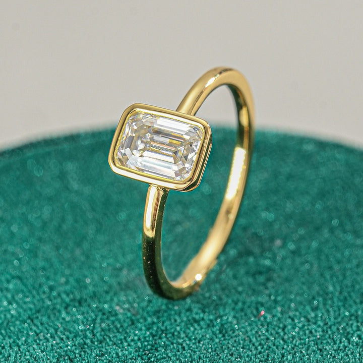 Minimalist Bezel 18K Gold Emerald-Cut Solitaire Ring