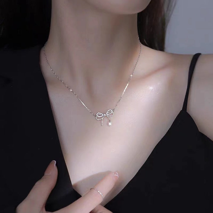 S925 Sterling Silver Pavé Bow Necklace with Dangling Charm