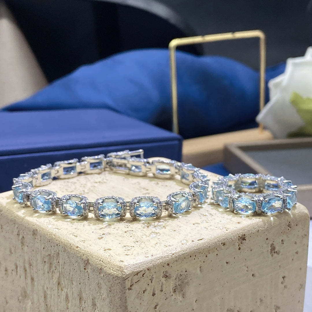 Ocean Blue Elegance 18K White Gold Aquamarine Halo Diamond Bracelet