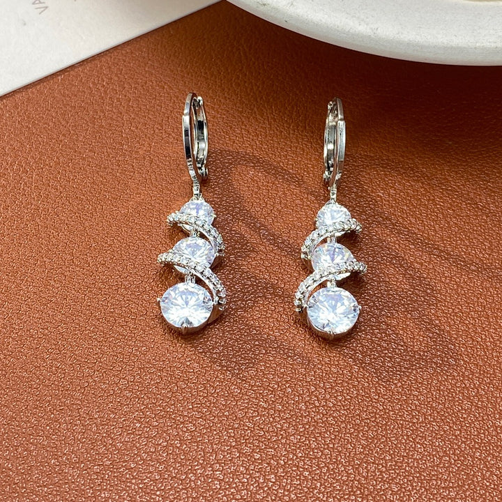 Galaxy Spiral S925 Silver Micro-Pavé Triple-Stone Huggie Earrings