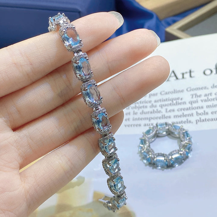 Ocean Blue Elegance 18K White Gold Aquamarine Halo Diamond Bracelet