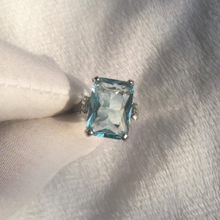 「Glacial Lake Blue」Emerald Cut Solitaire Ring
