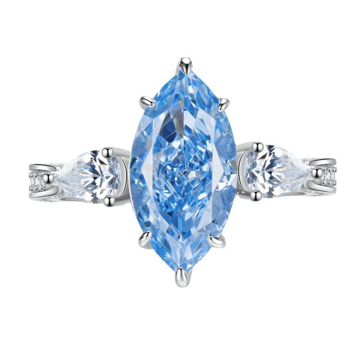 Ice Blue Promise · Marquise Solitaire & Pear Three-Stone Ring