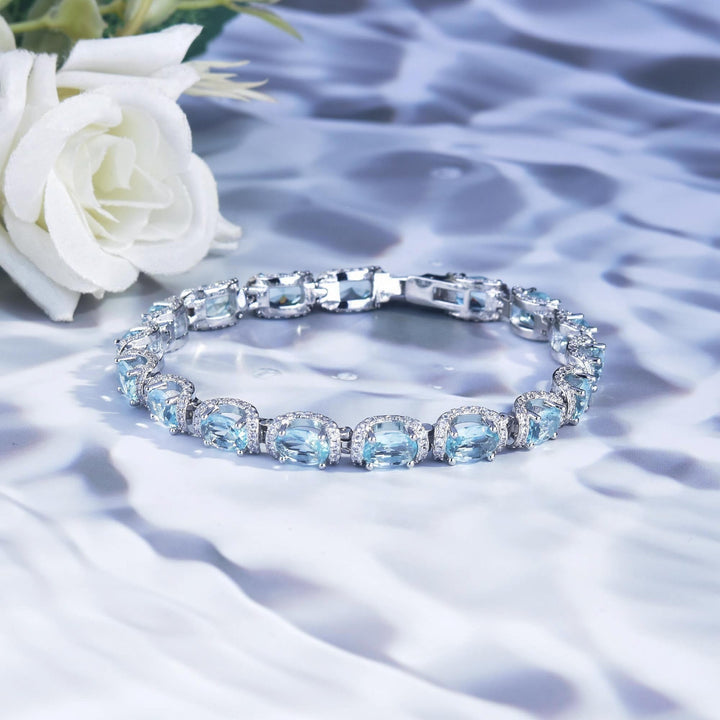 Ocean Blue Elegance 18K White Gold Aquamarine Halo Diamond Bracelet