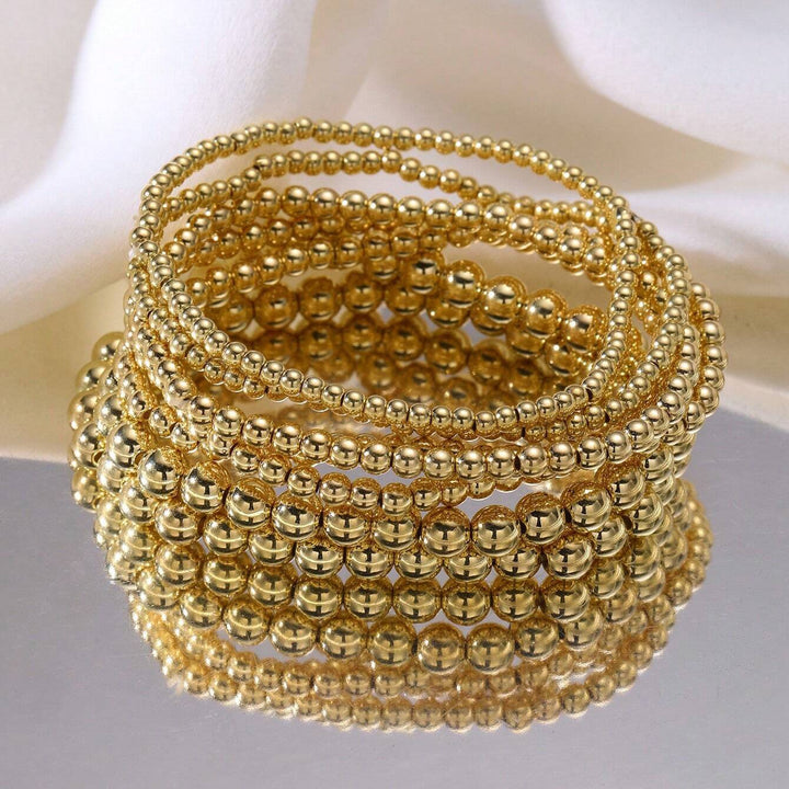 Stacked & Chic 8-Piece Gold Beaded Layering Bracelet Set