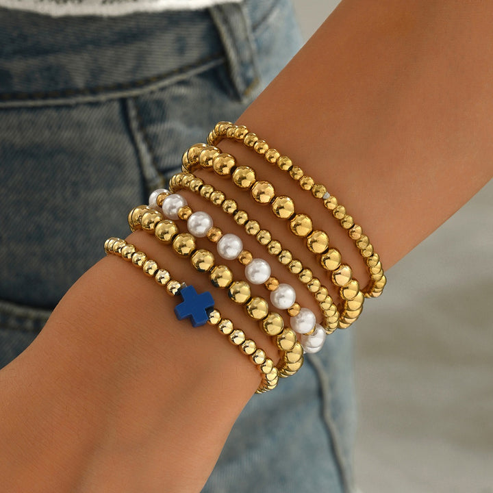 Stacked & Chic 8-Piece Gold Beaded Layering Bracelet Set