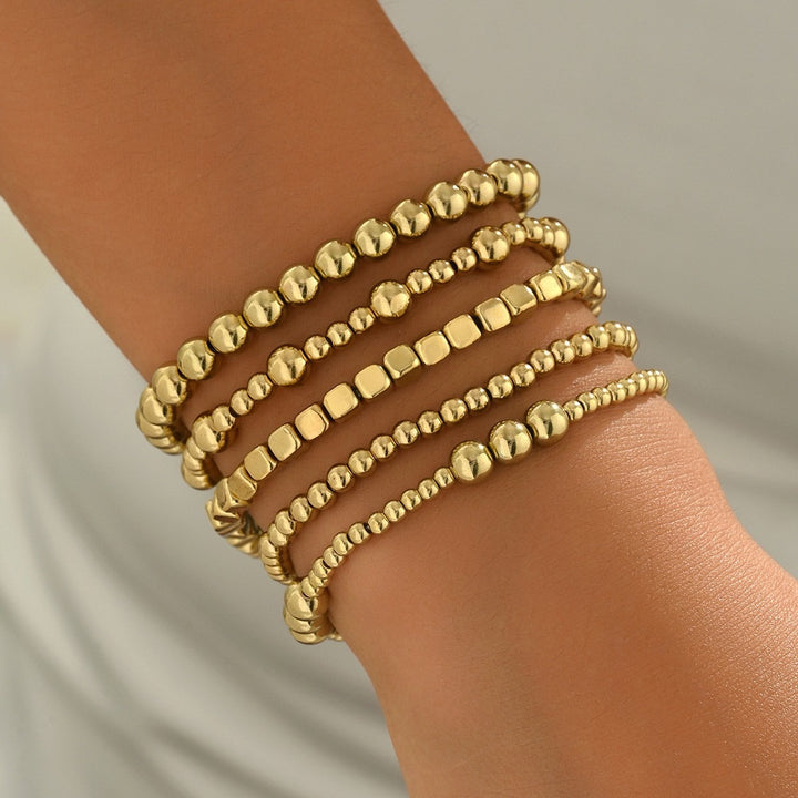 Stacked & Chic 8-Piece Gold Beaded Layering Bracelet Set